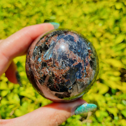 Arfvedsonite & Astrophyllite in Garnet Sphere - 348g