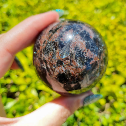 Arfvedsonite & Astrophyllite in Garnet Sphere - 348g